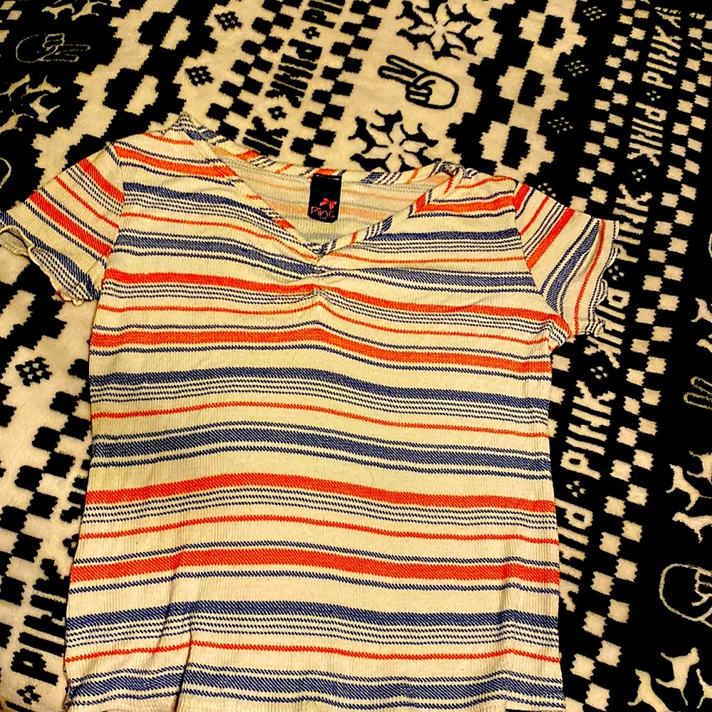 I’m selling a brand-new T-shirt just out of the package made for teen girls